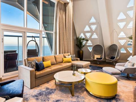Utopia of the Seas Royal Loft Suite (RL) living area, photo 1 of 8 Utopia of the Seas Royal Loft Suite (RL) living area, photo 1 of 8