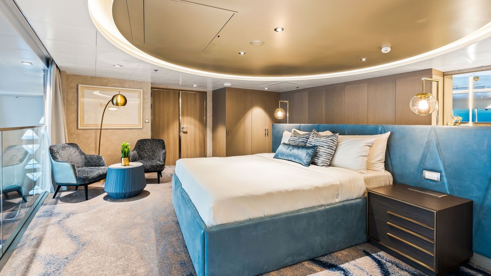 Utopia of the Seas Royal Loft Suite (RL) bedroom, photo 2 of 4