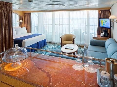 Vision of the Seas Grand Suite - 1 Bedroom (GS) living area, photo 1 of 5 Vision of the Seas Grand Suite - 1 Bedroom (GS) living area, photo 1 of 5