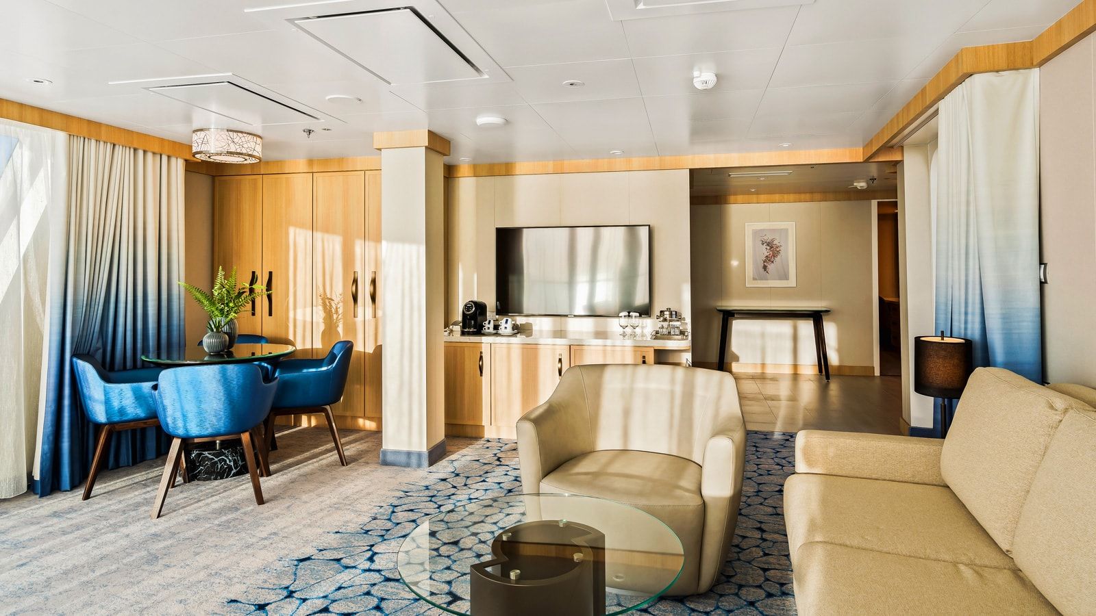 Wonder of the Seas Spacious AquaTheater Suite Large Balcony - 2 Bedroom (A1) living area, photo 2 of 3