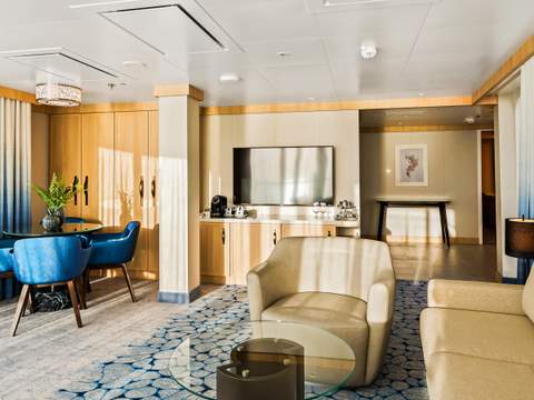 Wonder of the Seas Spacious AquaTheater Suite Large Balcony - 2 Bedroom (A1) living area, photo 2 of 3
