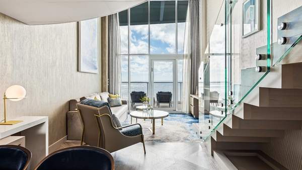 Wonder of the Seas Crown Loft Suite (L1) living area, photo 1 of 7 Wonder of the Seas Crown Loft Suite (L1) living area, photo 1 of 7