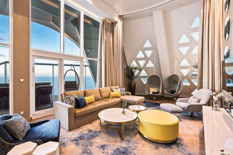 Wonder of the Seas Royal Loft Suite (RL) living area, photo 9 of 10