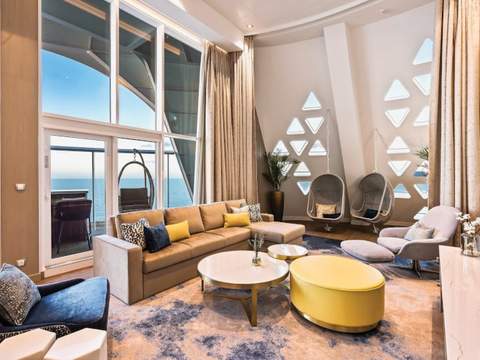 Wonder of the Seas Royal Loft Suite (RL) living area, photo 9 of 10