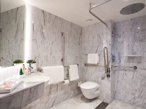 Virgin Voyages Seriously Suite - Accessible (SS) bathroom, photo 1 of 5