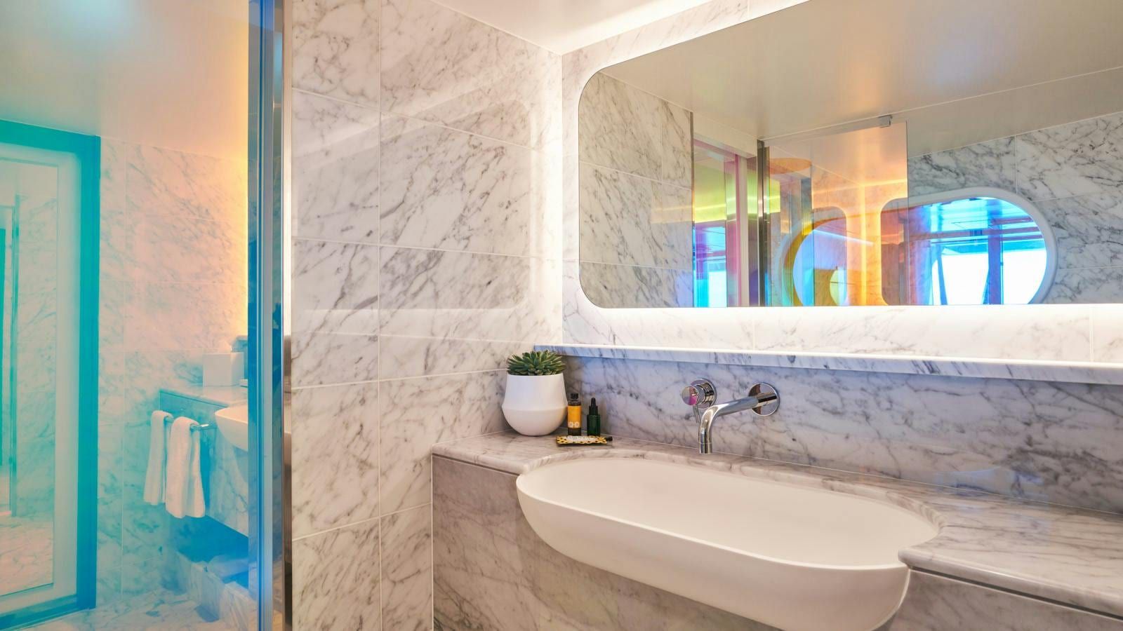 Virgin Voyages Gorgeous Suite (SG) bathroom, photo 1 of 2